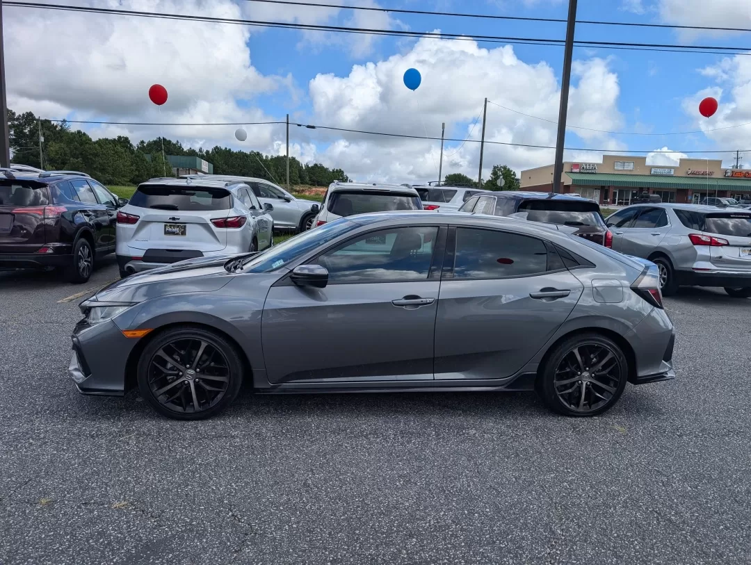 2020 Honda Civic Hatchback Sport (SHHFK7H46LU) with an Other engine, located at 3959 U.S. 80 W, Phenix City, AL, 36870, (334) 297-4885, 32.469296, -85.135185 - **Discover the Perfect Blend of Style and Efficiency: 2020 Honda Civic Hatchback Sport at Gils Auto - Opelika**<br /> <br /> Are you looking for a vehicle that effortlessly fits into your active lifestyle? Whether you're commuting to work, running errands around Opelika, or embarking on weekend geta - Photo#7