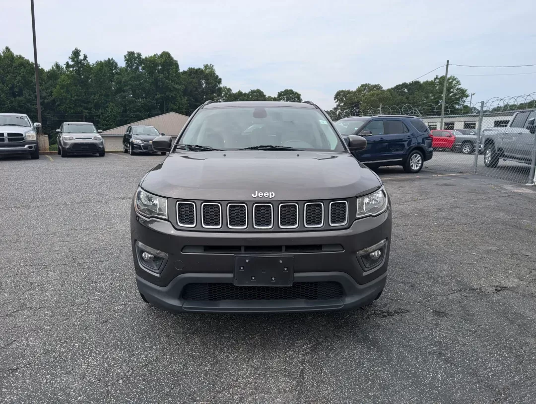 2017 /Black Jeep Compass Latitude (3C4NJDBBXHT) with an Other engine, located at 1430 Gateway Drive, Opelika, AL, 36801, (334) 239-0944, 32.637871, -85.409790 - **Adventure Awaits with This 2017 Jeep Compass Latitude at Gils Auto Opelika, AL!**<br /> <br /> Are you ready to embark on your next adventure? Whether you're a daily commuter navigating the hustle and bustle of Opelika or a weekend warrior seeking thrills on untamed trails, this 2017 Jeep Compass - Photo#1