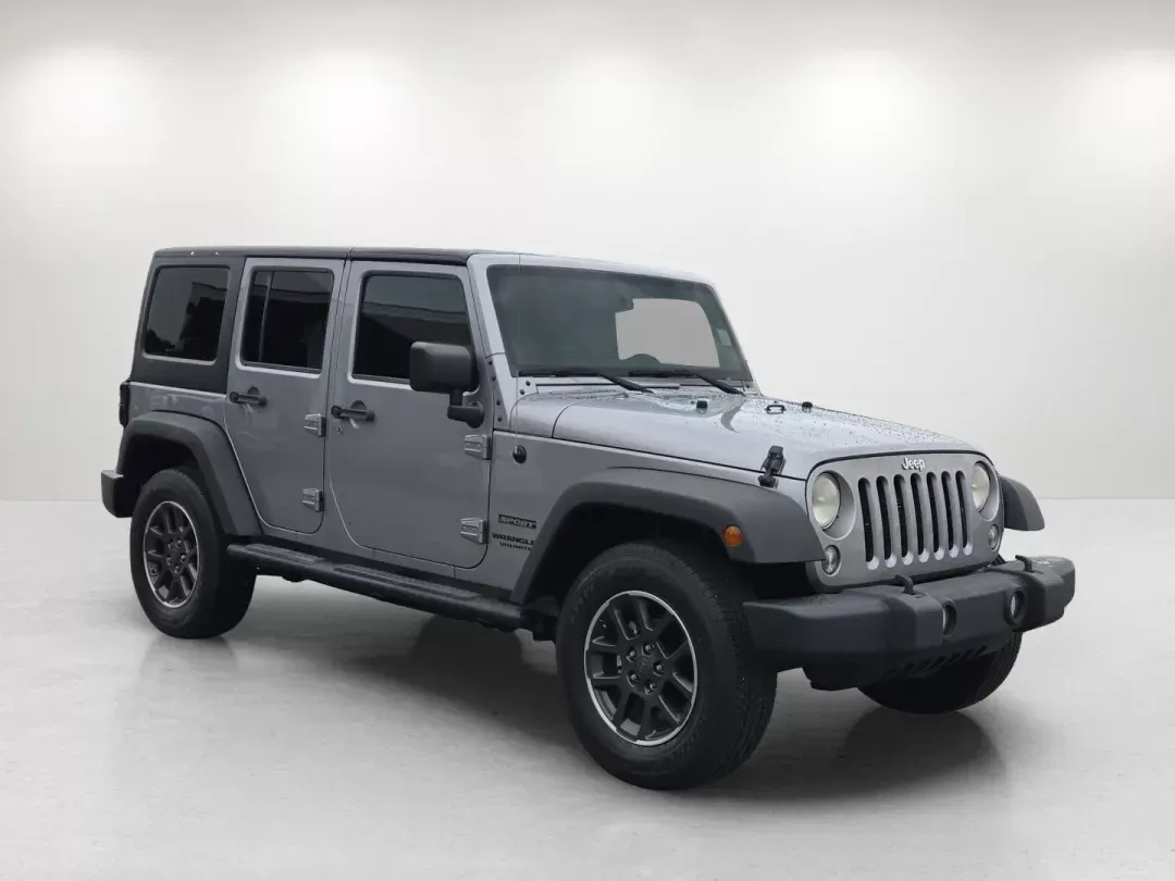 2014 /Black Jeep Wrangler Unlimited Sport (1C4BJWDG1EL) with an Other engine, located at 7000 Northlake Connector, Columbus, GA, 31904, (706) 987-8085, 32.524975, -84.978134 - Are you ready to embrace adventure and experience the thrill of the open road? Look no further than this stunning 2014 Jeep Wrangler Unlimited Sport, available now at Gils Auto - Columbus #2. Located at 7000 Northlake Connector, Columbus, GA 31904, we specialize in providing reliable vehicles throug - Photo#2