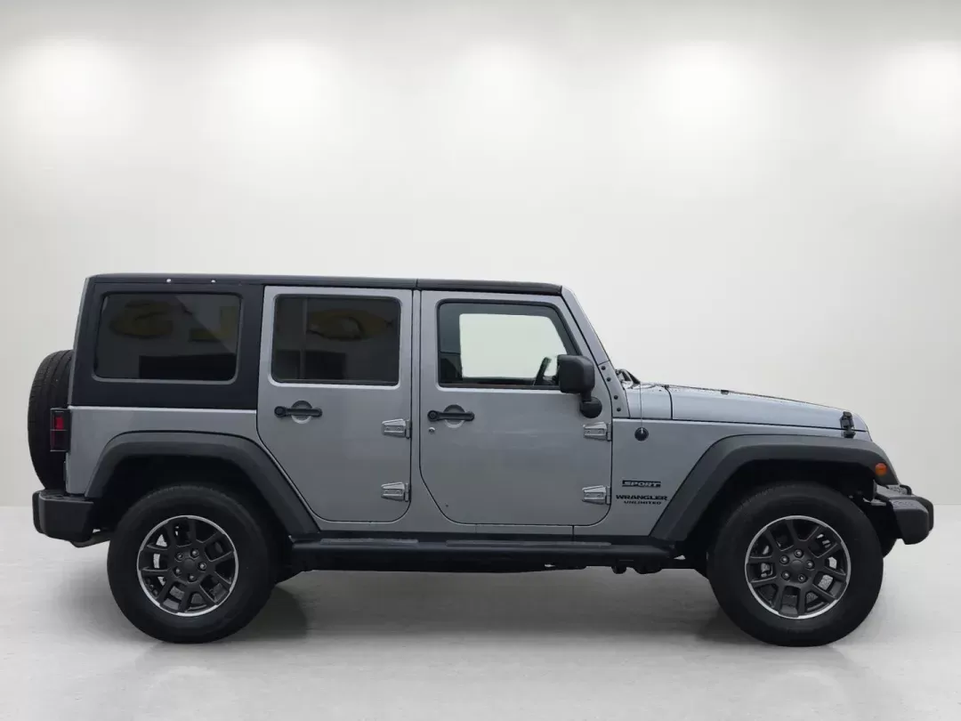 2014 /Black Jeep Wrangler Unlimited Sport (1C4BJWDG1EL) with an Other engine, located at 7000 Northlake Connector, Columbus, GA, 31904, (706) 987-8085, 32.524975, -84.978134 - Are you ready to embrace adventure and experience the thrill of the open road? Look no further than this stunning 2014 Jeep Wrangler Unlimited Sport, available now at Gils Auto - Columbus #2. Located at 7000 Northlake Connector, Columbus, GA 31904, we specialize in providing reliable vehicles throug - Photo#3