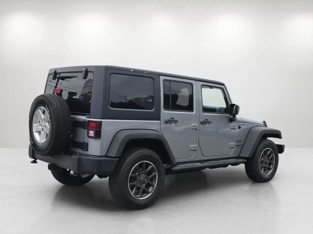 2014 /Black Jeep Wrangler Unlimited Sport (1C4BJWDG1EL) with an Other engine, located at 7000 Northlake Connector, Columbus, GA, 31904, (706) 987-8085, 32.524975, -84.978134 - Are you ready to embrace adventure and experience the thrill of the open road? Look no further than this stunning 2014 Jeep Wrangler Unlimited Sport, available now at Gils Auto - Columbus #2. Located at 7000 Northlake Connector, Columbus, GA 31904, we specialize in providing reliable vehicles throug - Photo#4