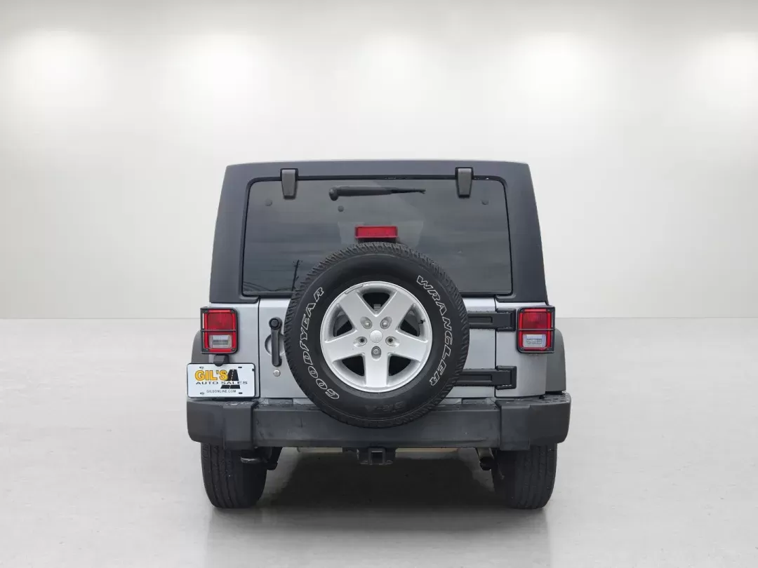 2014 /Black Jeep Wrangler Unlimited Sport (1C4BJWDG1EL) with an Other engine, located at 7000 Northlake Connector, Columbus, GA, 31904, (706) 987-8085, 32.524975, -84.978134 - Are you ready to embrace adventure and experience the thrill of the open road? Look no further than this stunning 2014 Jeep Wrangler Unlimited Sport, available now at Gils Auto - Columbus #2. Located at 7000 Northlake Connector, Columbus, GA 31904, we specialize in providing reliable vehicles throug - Photo#5