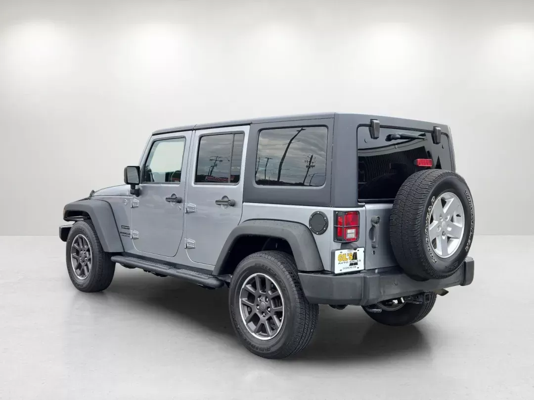 2014 /Black Jeep Wrangler Unlimited Sport (1C4BJWDG1EL) with an Other engine, located at 7000 Northlake Connector, Columbus, GA, 31904, (706) 987-8085, 32.524975, -84.978134 - Are you ready to embrace adventure and experience the thrill of the open road? Look no further than this stunning 2014 Jeep Wrangler Unlimited Sport, available now at Gils Auto - Columbus #2. Located at 7000 Northlake Connector, Columbus, GA 31904, we specialize in providing reliable vehicles throug - Photo#6