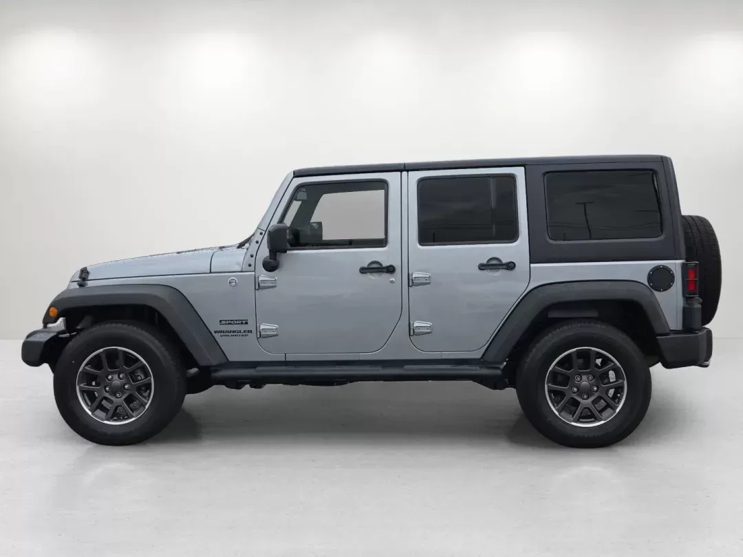 2014 /Black Jeep Wrangler Unlimited Sport (1C4BJWDG1EL) with an Other engine, located at 7000 Northlake Connector, Columbus, GA, 31904, (706) 987-8085, 32.524975, -84.978134 - Are you ready to embrace adventure and experience the thrill of the open road? Look no further than this stunning 2014 Jeep Wrangler Unlimited Sport, available now at Gils Auto - Columbus #2. Located at 7000 Northlake Connector, Columbus, GA 31904, we specialize in providing reliable vehicles throug - Photo#7