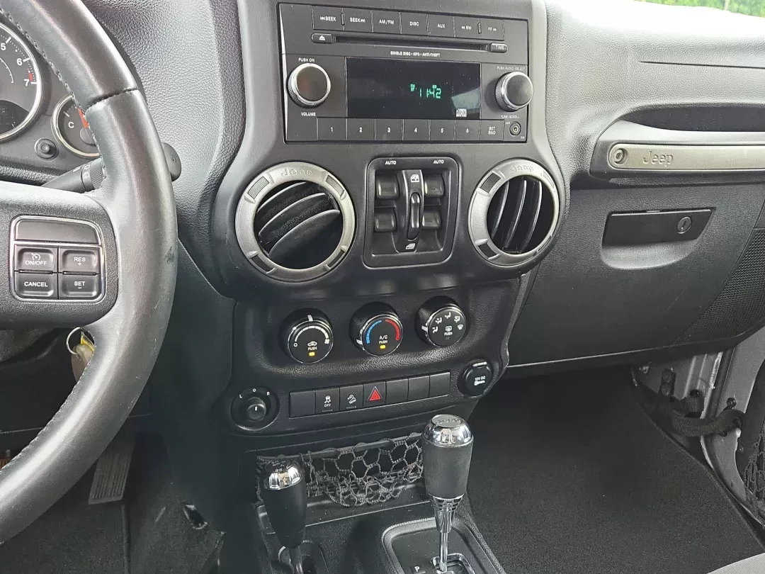 2014 /Black Jeep Wrangler Unlimited Sport (1C4BJWDG1EL) with an Other engine, located at 7000 Northlake Connector, Columbus, GA, 31904, (706) 987-8085, 32.524975, -84.978134 - Are you ready to embrace adventure and experience the thrill of the open road? Look no further than this stunning 2014 Jeep Wrangler Unlimited Sport, available now at Gils Auto - Columbus #2. Located at 7000 Northlake Connector, Columbus, GA 31904, we specialize in providing reliable vehicles throug - Photo#15