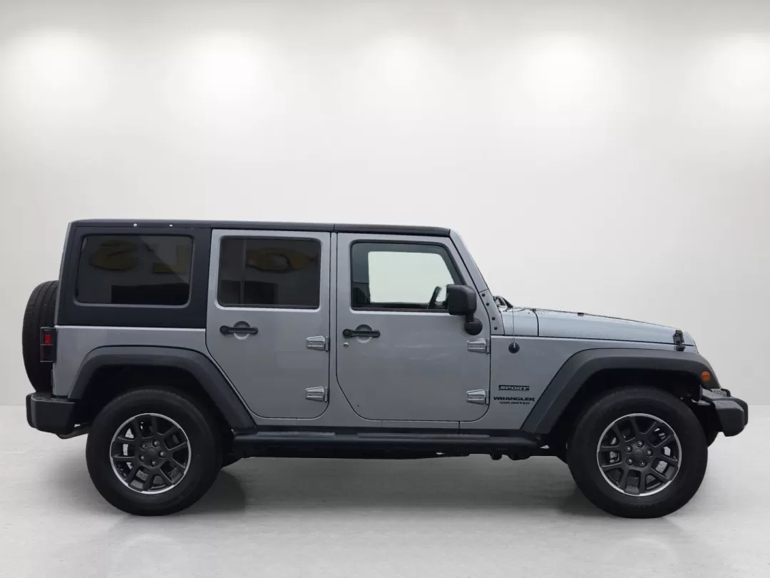 2014 /Black Jeep Wrangler Sport (1C4BJWDG1EL) with an Other engine, located at 5115 14th Ave., Columbus, GA, 31904, (706) 323-0345, 32.511494, -84.971046 - **Adventure Awaits with the 2014 Jeep Wrangler Unlimited Sport** <br /> Are you ready to elevate your weekend adventures and make unforgettable memories? The 2014 Jeep Wrangler Unlimited Sport, available at Gils Auto - Columbus #2, is your ticket to exploration and fun. Imagine cruising through the - Photo#3