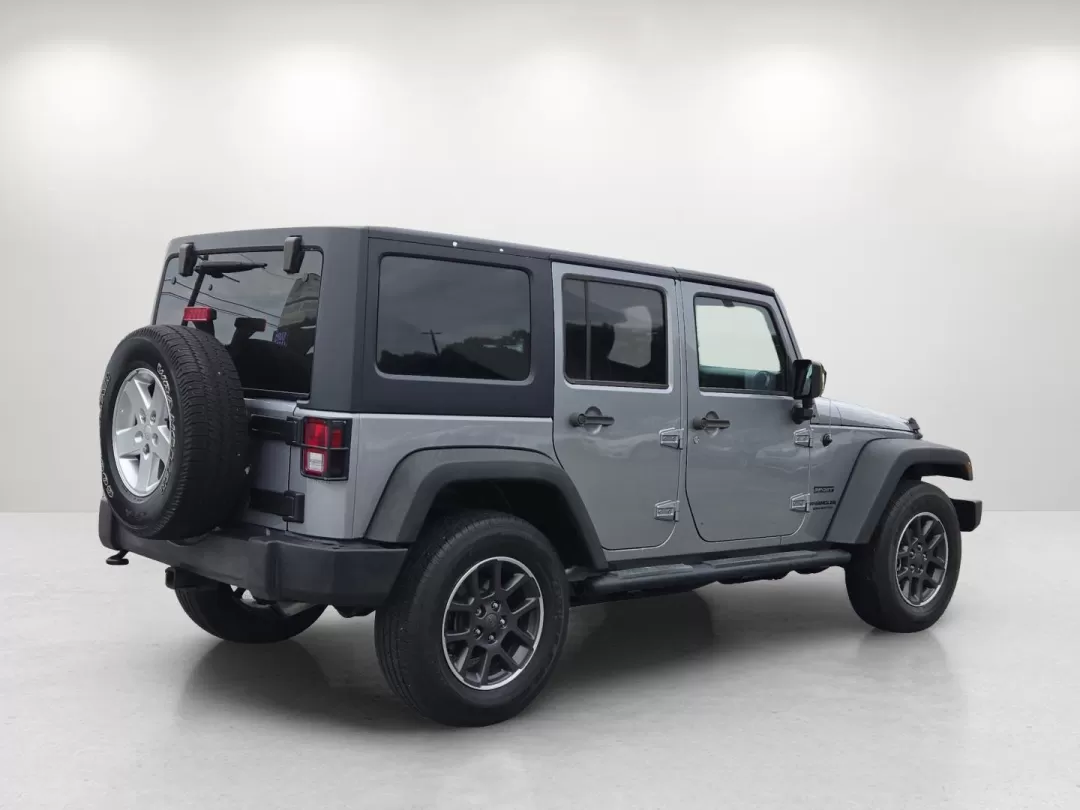 2014 /Black Jeep Wrangler Sport (1C4BJWDG1EL) with an Other engine, located at 5115 14th Ave., Columbus, GA, 31904, (706) 323-0345, 32.511494, -84.971046 - **Adventure Awaits with the 2014 Jeep Wrangler Unlimited Sport** <br /> Are you ready to elevate your weekend adventures and make unforgettable memories? The 2014 Jeep Wrangler Unlimited Sport, available at Gils Auto - Columbus #2, is your ticket to exploration and fun. Imagine cruising through the - Photo#4