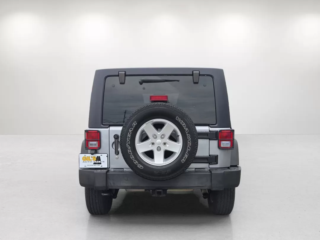 2014 /Black Jeep Wrangler Sport (1C4BJWDG1EL) with an Other engine, located at 5115 14th Ave., Columbus, GA, 31904, (706) 323-0345, 32.511494, -84.971046 - **Adventure Awaits with the 2014 Jeep Wrangler Unlimited Sport** <br /> Are you ready to elevate your weekend adventures and make unforgettable memories? The 2014 Jeep Wrangler Unlimited Sport, available at Gils Auto - Columbus #2, is your ticket to exploration and fun. Imagine cruising through the - Photo#5
