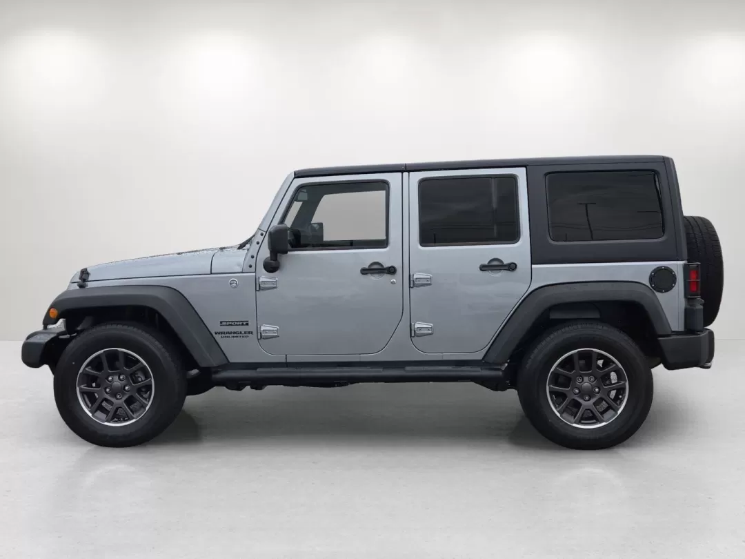 2014 /Black Jeep Wrangler Sport (1C4BJWDG1EL) with an Other engine, located at 5115 14th Ave., Columbus, GA, 31904, (706) 323-0345, 32.511494, -84.971046 - **Adventure Awaits with the 2014 Jeep Wrangler Unlimited Sport** <br /> Are you ready to elevate your weekend adventures and make unforgettable memories? The 2014 Jeep Wrangler Unlimited Sport, available at Gils Auto - Columbus #2, is your ticket to exploration and fun. Imagine cruising through the - Photo#7