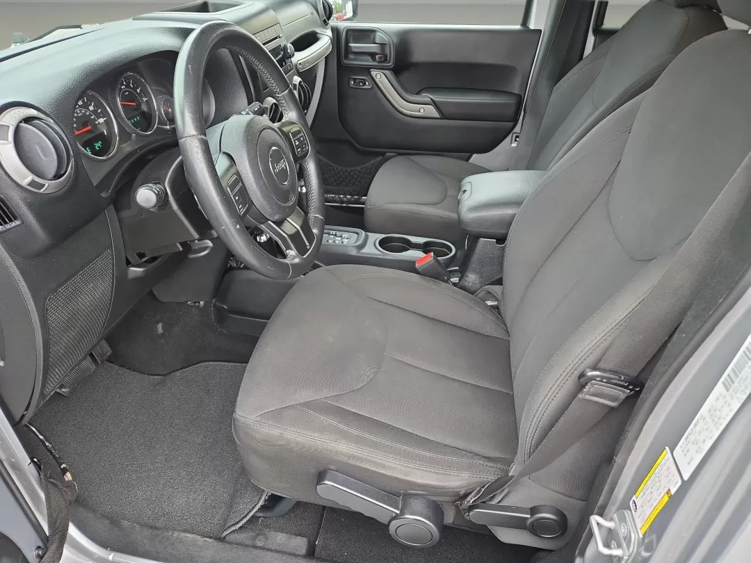2014 /Black Jeep Wrangler Sport (1C4BJWDG1EL) with an Other engine, located at 5115 14th Ave., Columbus, GA, 31904, (706) 323-0345, 32.511494, -84.971046 - **Adventure Awaits with the 2014 Jeep Wrangler Unlimited Sport** <br /> Are you ready to elevate your weekend adventures and make unforgettable memories? The 2014 Jeep Wrangler Unlimited Sport, available at Gils Auto - Columbus #2, is your ticket to exploration and fun. Imagine cruising through the - Photo#10