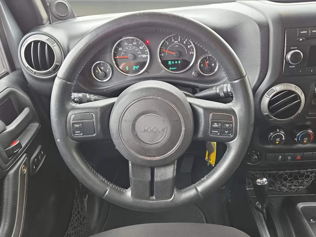 2014 /Black Jeep Wrangler Sport (1C4BJWDG1EL) with an Other engine, located at 5115 14th Ave., Columbus, GA, 31904, (706) 323-0345, 32.511494, -84.971046 - **Adventure Awaits with the 2014 Jeep Wrangler Unlimited Sport** <br /> Are you ready to elevate your weekend adventures and make unforgettable memories? The 2014 Jeep Wrangler Unlimited Sport, available at Gils Auto - Columbus #2, is your ticket to exploration and fun. Imagine cruising through the - Photo#14