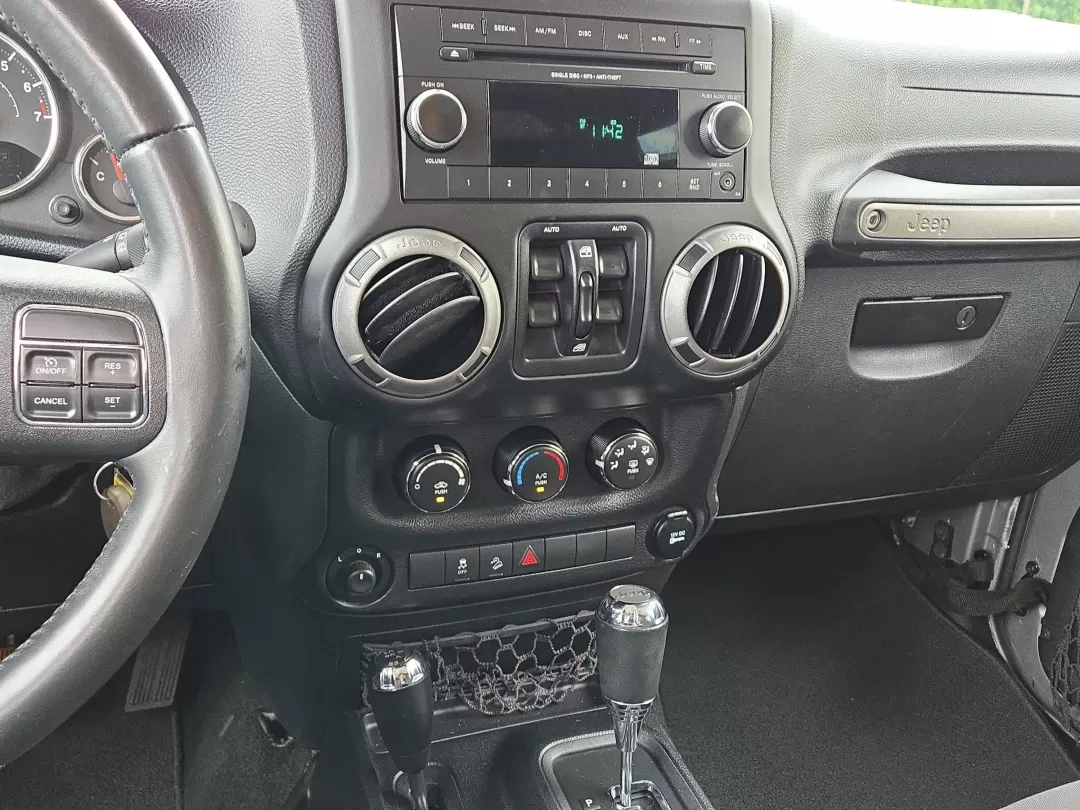 2014 /Black Jeep Wrangler Sport (1C4BJWDG1EL) with an Other engine, located at 5115 14th Ave., Columbus, GA, 31904, (706) 323-0345, 32.511494, -84.971046 - **Adventure Awaits with the 2014 Jeep Wrangler Unlimited Sport** <br /> Are you ready to elevate your weekend adventures and make unforgettable memories? The 2014 Jeep Wrangler Unlimited Sport, available at Gils Auto - Columbus #2, is your ticket to exploration and fun. Imagine cruising through the - Photo#15