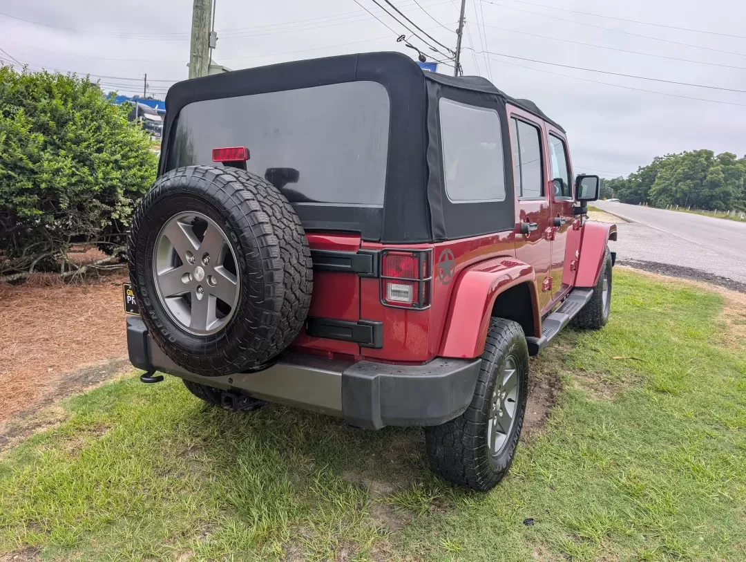 2013 /Black Interior Jeep Wrangler Unlimited Freedom Edition (1C4BJWDG6DL) with an Other engine, located at 7000 Northlake Connector, Columbus, GA, 31904, (706) 987-8085, 32.524975, -84.978134 - **Adventure Awaits: 2013 Jeep Wrangler Unlimited Freedom Edition Your Next Weekend Warrior!**<br /> <br /> Are you ready to elevate your adventures? Whether you're planning weekend getaways, tackling rugged terrains, or simply cruising around Phenix City, AL, the 2013 Jeep Wrangler Unlimited Freedo - Photo#4