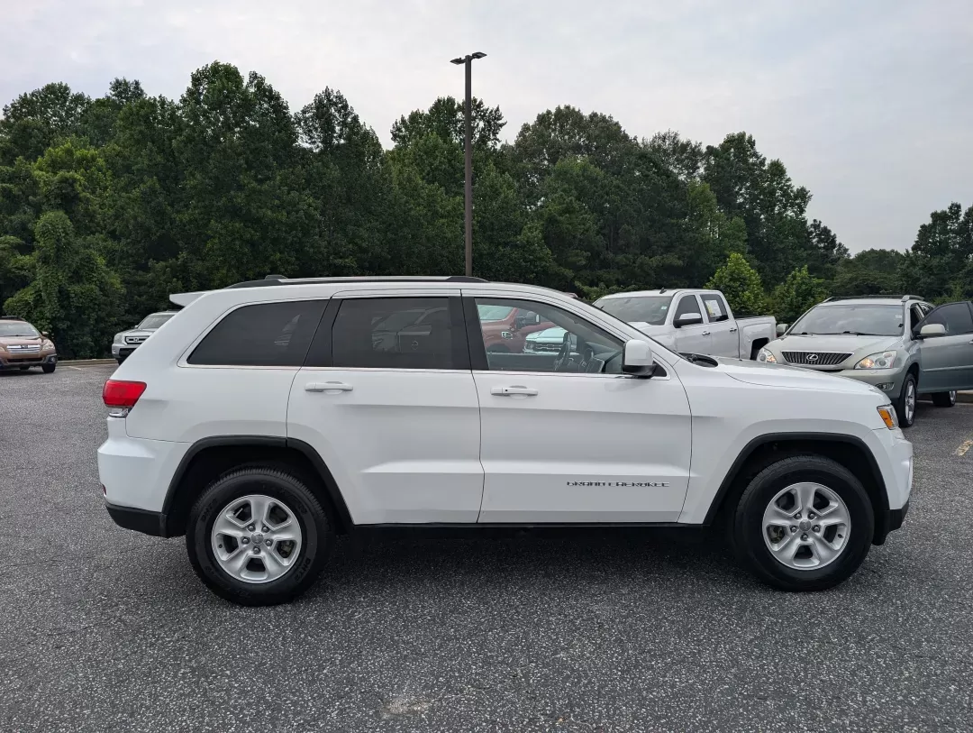 2016 /Lt Frost Beige/Black Jeep Grand Cherokee Laredo (1C4RJEAG8GC) with an Other engine, located at 7000 Northlake Connector, Columbus, GA, 31904, (706) 987-8085, 32.524975, -84.978134 - Discover the perfect blend of adventure and everyday practicality with the 2016 Jeep Grand Cherokee Laredo, now available at Gils Auto in Phenix City, AL! This remarkable SUV is designed for those seeking versatility, whether you're tackling the daily commute, planning a weekend getaway, or navigati - Photo#3