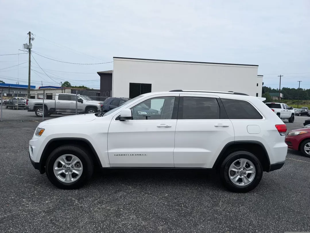 2016 /Lt Frost Beige/Black Jeep Grand Cherokee Laredo (1C4RJEAG8GC) with an Other engine, located at 7000 Northlake Connector, Columbus, GA, 31904, (706) 987-8085, 32.524975, -84.978134 - Discover the perfect blend of adventure and everyday practicality with the 2016 Jeep Grand Cherokee Laredo, now available at Gils Auto in Phenix City, AL! This remarkable SUV is designed for those seeking versatility, whether you're tackling the daily commute, planning a weekend getaway, or navigati - Photo#7