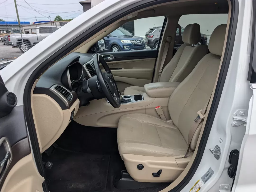 2016 /Lt Frost Beige/Black Jeep Grand Cherokee Laredo (1C4RJEAG8GC) with an Other engine, located at 7000 Northlake Connector, Columbus, GA, 31904, (706) 987-8085, 32.524975, -84.978134 - Discover the perfect blend of adventure and everyday practicality with the 2016 Jeep Grand Cherokee Laredo, now available at Gils Auto in Phenix City, AL! This remarkable SUV is designed for those seeking versatility, whether you're tackling the daily commute, planning a weekend getaway, or navigati - Photo#9