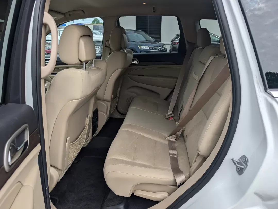 2016 /Lt Frost Beige/Black Jeep Grand Cherokee Laredo (1C4RJEAG8GC) with an Other engine, located at 7000 Northlake Connector, Columbus, GA, 31904, (706) 987-8085, 32.524975, -84.978134 - Discover the perfect blend of adventure and everyday practicality with the 2016 Jeep Grand Cherokee Laredo, now available at Gils Auto in Phenix City, AL! This remarkable SUV is designed for those seeking versatility, whether you're tackling the daily commute, planning a weekend getaway, or navigati - Photo#10