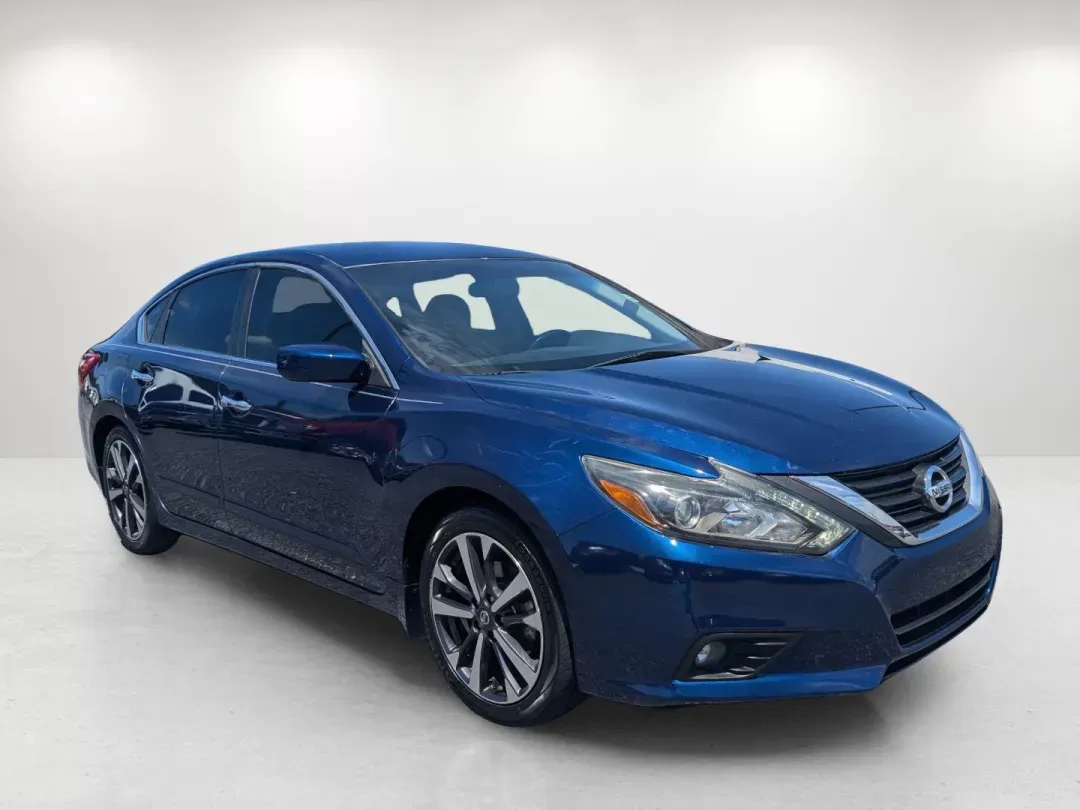2016 /Charcoal Nissan Altima 2.5 SR (1N4AL3AP1GC) with an Other engine, located at 804 22nd Ave, Phenix City, AL, 36870, (334) 297-1860, 32.484749, -85.024475 - Are you in search of a reliable sedan that perfectly balances style, performance, and practicality? Look no further than this stunning 2016 Nissan Altima 2.5 SR, now available at Gils Auto in Phenix City, AL. With its sleek Deep Blue Pearl exterior and comfortable charcoal cloth interior, this vehic - Photo#2