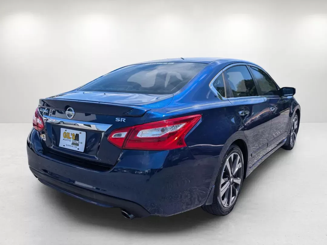 2016 /Charcoal Nissan Altima 2.5 SR (1N4AL3AP1GC) with an Other engine, located at 804 22nd Ave, Phenix City, AL, 36870, (334) 297-1860, 32.484749, -85.024475 - Are you in search of a reliable sedan that perfectly balances style, performance, and practicality? Look no further than this stunning 2016 Nissan Altima 2.5 SR, now available at Gils Auto in Phenix City, AL. With its sleek Deep Blue Pearl exterior and comfortable charcoal cloth interior, this vehic - Photo#4