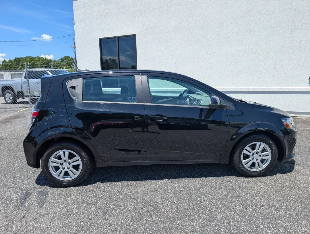 2019 /Jet Black/Dark Titanium Chevrolet Sonic LT (1G1JG6SB9K4) with an Other engine, located at 3959 U.S. 80 W, Phenix City, AL, 36870, (334) 297-4885, 32.469296, -85.135185 - **Experience the Freedom of the Open Road with the 2019 Chevrolet Sonic LT at Gils Auto!** <br /> <br /> If you're searching for a stylish, reliable hatchback that fits seamlessly into your busy lifestyle, look no further than this 2019 Chevrolet Sonic LT. Perfect for commuters, families, or anyone - Photo#3