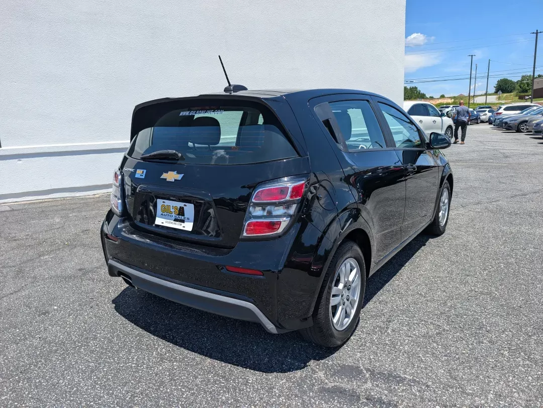 2019 /Jet Black/Dark Titanium Chevrolet Sonic LT (1G1JG6SB9K4) with an Other engine, located at 3959 U.S. 80 W, Phenix City, AL, 36870, (334) 297-4885, 32.469296, -85.135185 - **Experience the Freedom of the Open Road with the 2019 Chevrolet Sonic LT at Gils Auto!** <br /> <br /> If you're searching for a stylish, reliable hatchback that fits seamlessly into your busy lifestyle, look no further than this 2019 Chevrolet Sonic LT. Perfect for commuters, families, or anyone - Photo#4