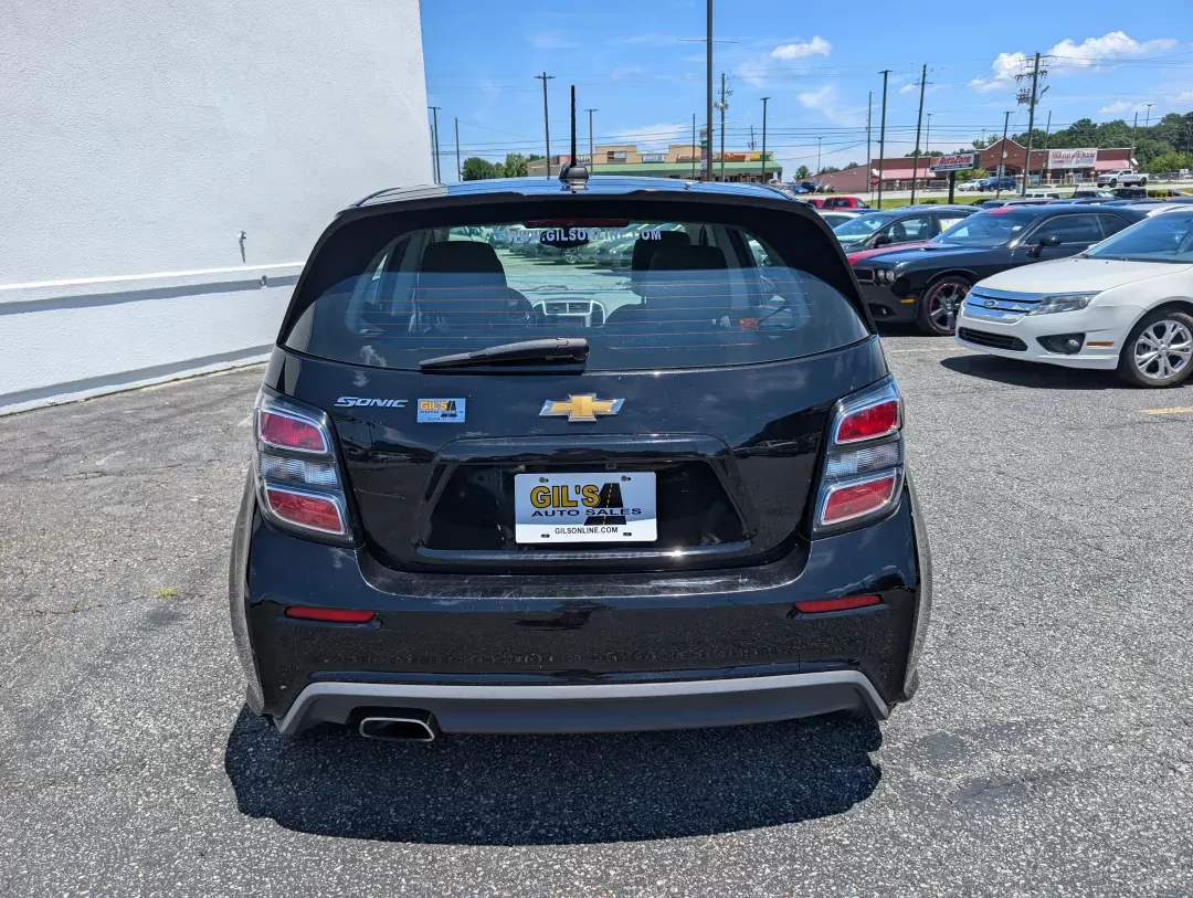 2019 /Jet Black/Dark Titanium Chevrolet Sonic LT (1G1JG6SB9K4) with an Other engine, located at 3959 U.S. 80 W, Phenix City, AL, 36870, (334) 297-4885, 32.469296, -85.135185 - **Experience the Freedom of the Open Road with the 2019 Chevrolet Sonic LT at Gils Auto!** <br /> <br /> If you're searching for a stylish, reliable hatchback that fits seamlessly into your busy lifestyle, look no further than this 2019 Chevrolet Sonic LT. Perfect for commuters, families, or anyone - Photo#5