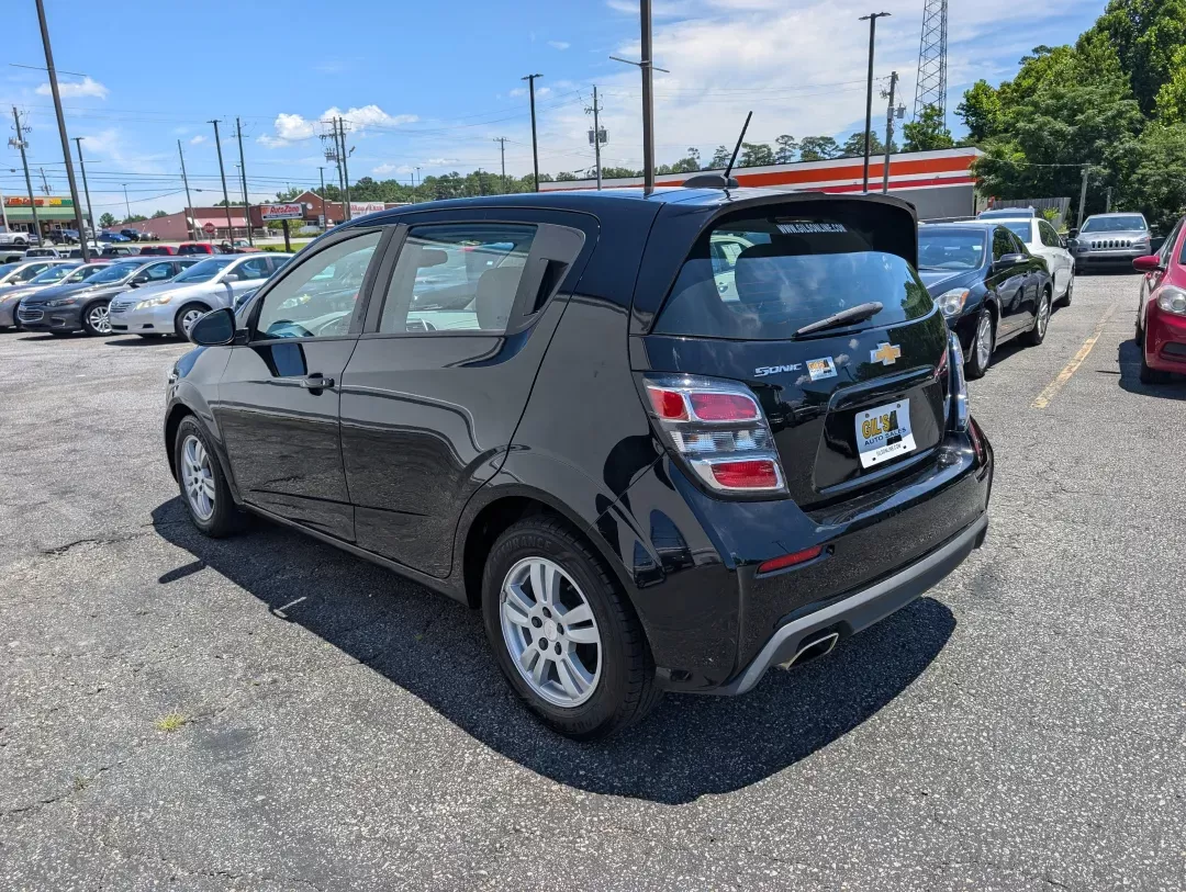 2019 /Jet Black/Dark Titanium Chevrolet Sonic LT (1G1JG6SB9K4) with an Other engine, located at 3959 U.S. 80 W, Phenix City, AL, 36870, (334) 297-4885, 32.469296, -85.135185 - **Experience the Freedom of the Open Road with the 2019 Chevrolet Sonic LT at Gils Auto!** <br /> <br /> If you're searching for a stylish, reliable hatchback that fits seamlessly into your busy lifestyle, look no further than this 2019 Chevrolet Sonic LT. Perfect for commuters, families, or anyone - Photo#6