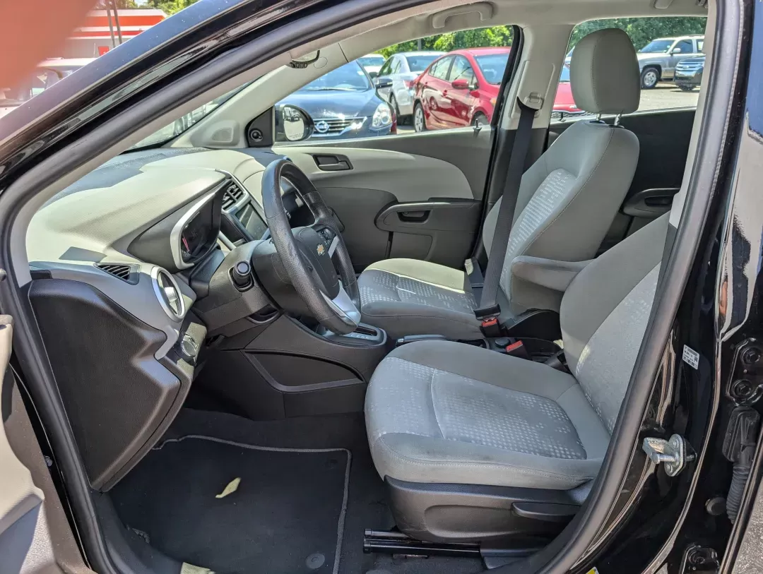2019 /Jet Black/Dark Titanium Chevrolet Sonic LT (1G1JG6SB9K4) with an Other engine, located at 3959 U.S. 80 W, Phenix City, AL, 36870, (334) 297-4885, 32.469296, -85.135185 - **Experience the Freedom of the Open Road with the 2019 Chevrolet Sonic LT at Gils Auto!** <br /> <br /> If you're searching for a stylish, reliable hatchback that fits seamlessly into your busy lifestyle, look no further than this 2019 Chevrolet Sonic LT. Perfect for commuters, families, or anyone - Photo#8