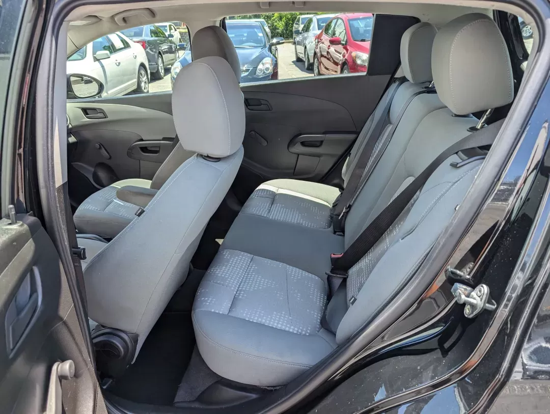 2019 /Jet Black/Dark Titanium Chevrolet Sonic LT (1G1JG6SB9K4) with an Other engine, located at 3959 U.S. 80 W, Phenix City, AL, 36870, (334) 297-4885, 32.469296, -85.135185 - **Experience the Freedom of the Open Road with the 2019 Chevrolet Sonic LT at Gils Auto!** <br /> <br /> If you're searching for a stylish, reliable hatchback that fits seamlessly into your busy lifestyle, look no further than this 2019 Chevrolet Sonic LT. Perfect for commuters, families, or anyone - Photo#9