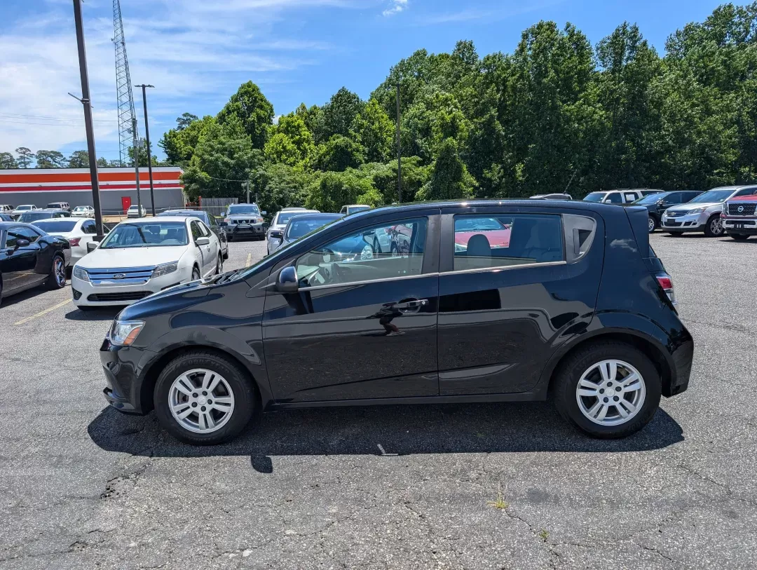 2019 /Jet Black/Dark Titanium Chevrolet Sonic LT (1G1JG6SB9K4) with an Other engine, located at 3959 U.S. 80 W, Phenix City, AL, 36870, (334) 297-4885, 32.469296, -85.135185 - **Experience the Freedom of the Open Road with the 2019 Chevrolet Sonic LT at Gils Auto!** <br /> <br /> If you're searching for a stylish, reliable hatchback that fits seamlessly into your busy lifestyle, look no further than this 2019 Chevrolet Sonic LT. Perfect for commuters, families, or anyone - Photo#15