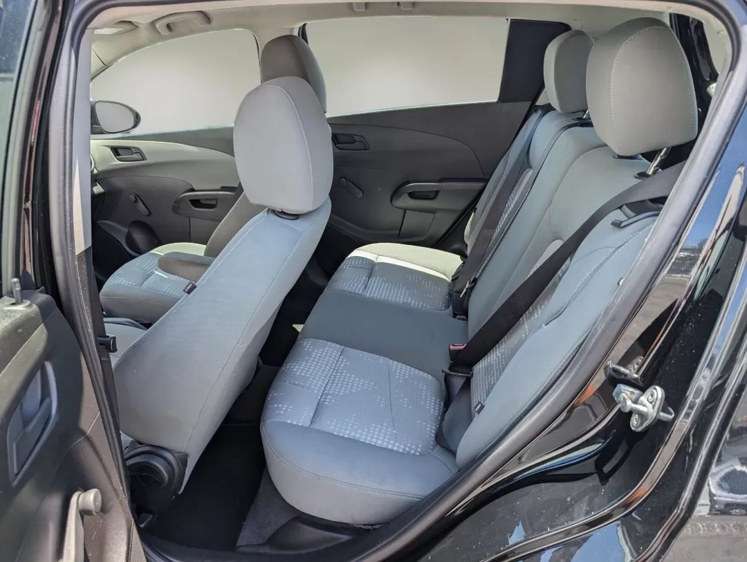 2019 /Jet Black/Dark Titanium Chevrolet Sonic LT (1G1JG6SB9K4) with an Other engine, located at 804 22nd Ave, Phenix City, AL, 36870, (334) 297-1860, 32.484749, -85.024475 - **Discover Your Perfect Companion for Daily Adventures: The 2019 Chevrolet Sonic LT Hatchback at Gils Auto!**<br /> <br /> Looking for a versatile and stylish hatchback that fits seamlessly into your busy lifestyle? The 2019 Chevrolet Sonic LT is your answer! Perfect for urban commuters, families on - Photo#9