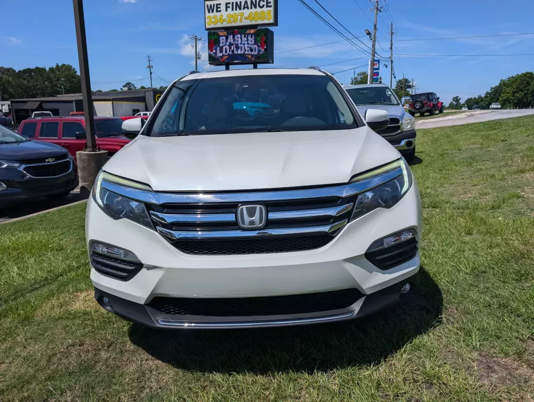2016 Honda Pilot Elite (5FNYF6H07GB) with an Other engine, located at 3959 U.S. 80 W, Phenix City, AL, 36870, (334) 297-4885, 32.469296, -85.135185 - Elevate your family adventures with this stunning 2016 Honda Pilot Elite AWD, available now at **Gils Auto** in Phenix City, AL. Perfect for growing families or those who crave weekend getaways, this spacious SUV is designed to accommodate every journey, whether it's a trip to the grocery store or a - Photo#1