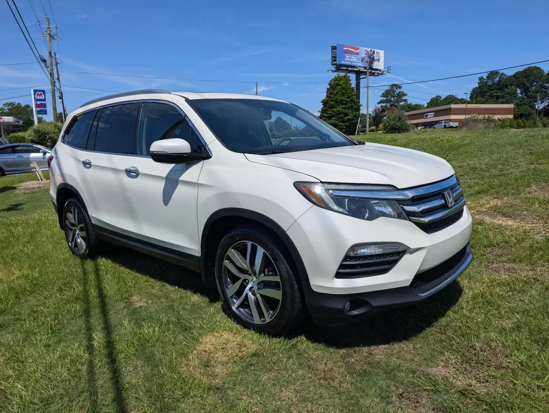 2016 Honda Pilot Elite (5FNYF6H07GB) with an Other engine, located at 3959 U.S. 80 W, Phenix City, AL, 36870, (334) 297-4885, 32.469296, -85.135185 - Elevate your family adventures with this stunning 2016 Honda Pilot Elite AWD, available now at **Gils Auto** in Phenix City, AL. Perfect for growing families or those who crave weekend getaways, this spacious SUV is designed to accommodate every journey, whether it's a trip to the grocery store or a - Photo#2