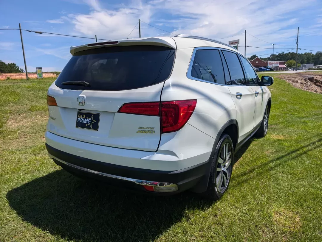 2016 Honda Pilot Elite (5FNYF6H07GB) with an Other engine, located at 3959 U.S. 80 W, Phenix City, AL, 36870, (334) 297-4885, 32.469296, -85.135185 - Elevate your family adventures with this stunning 2016 Honda Pilot Elite AWD, available now at **Gils Auto** in Phenix City, AL. Perfect for growing families or those who crave weekend getaways, this spacious SUV is designed to accommodate every journey, whether it's a trip to the grocery store or a - Photo#4