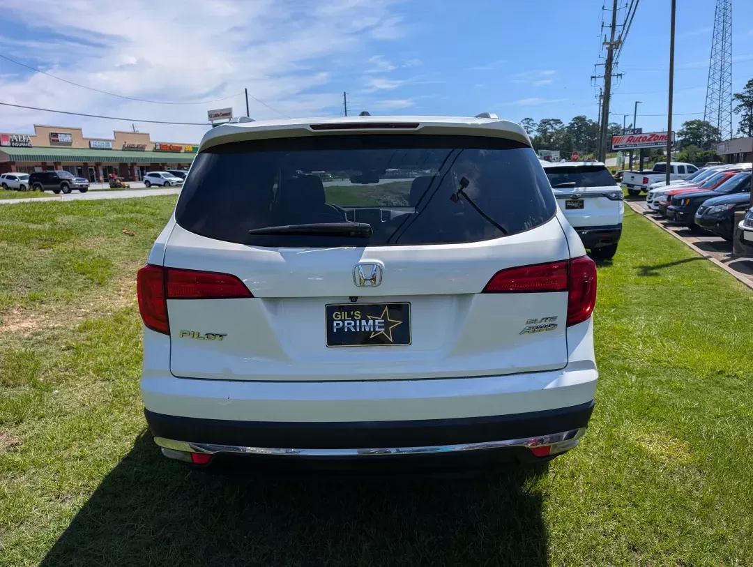2016 Honda Pilot Elite (5FNYF6H07GB) with an Other engine, located at 3959 U.S. 80 W, Phenix City, AL, 36870, (334) 297-4885, 32.469296, -85.135185 - Elevate your family adventures with this stunning 2016 Honda Pilot Elite AWD, available now at **Gils Auto** in Phenix City, AL. Perfect for growing families or those who crave weekend getaways, this spacious SUV is designed to accommodate every journey, whether it's a trip to the grocery store or a - Photo#5