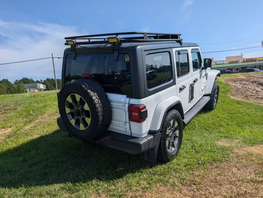2018 /Black Jeep Wrangler Unlimited Sahara (1C4HJXEG3JW) with an Other engine, located at 3959 U.S. 80 W, Phenix City, AL, 36870, (334) 297-4885, 32.469296, -85.135185 - Adventure awaits with this stunning 2018 Jeep Wrangler Unlimited Sahara, a perfect companion for those who love the great outdoors! Whether you're navigating weekend getaways, family road trips, or simply commuting to work in style, this convertible 4WD SUV is designed to meet all your driving needs - Photo#4