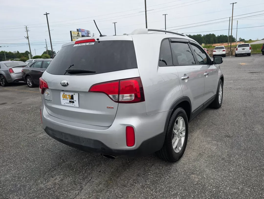 2014 /Black Kia Sorento LX (5XYKTDA6XEG) with an Other engine, located at 3959 U.S. 80 W, Phenix City, AL, 36870, (334) 297-4885, 32.469296, -85.135185 - **Embark on Your Next Adventure with the 2014 Kia Sorento LX at Gils Auto in Phenix City, AL!**<br /> <br /> Are you ready to enhance your lifestyle and explore new horizons? With the 2014 Kia Sorento LX, you'll have the perfect companion for family outings, weekend adventures, and everything in bet - Photo#4