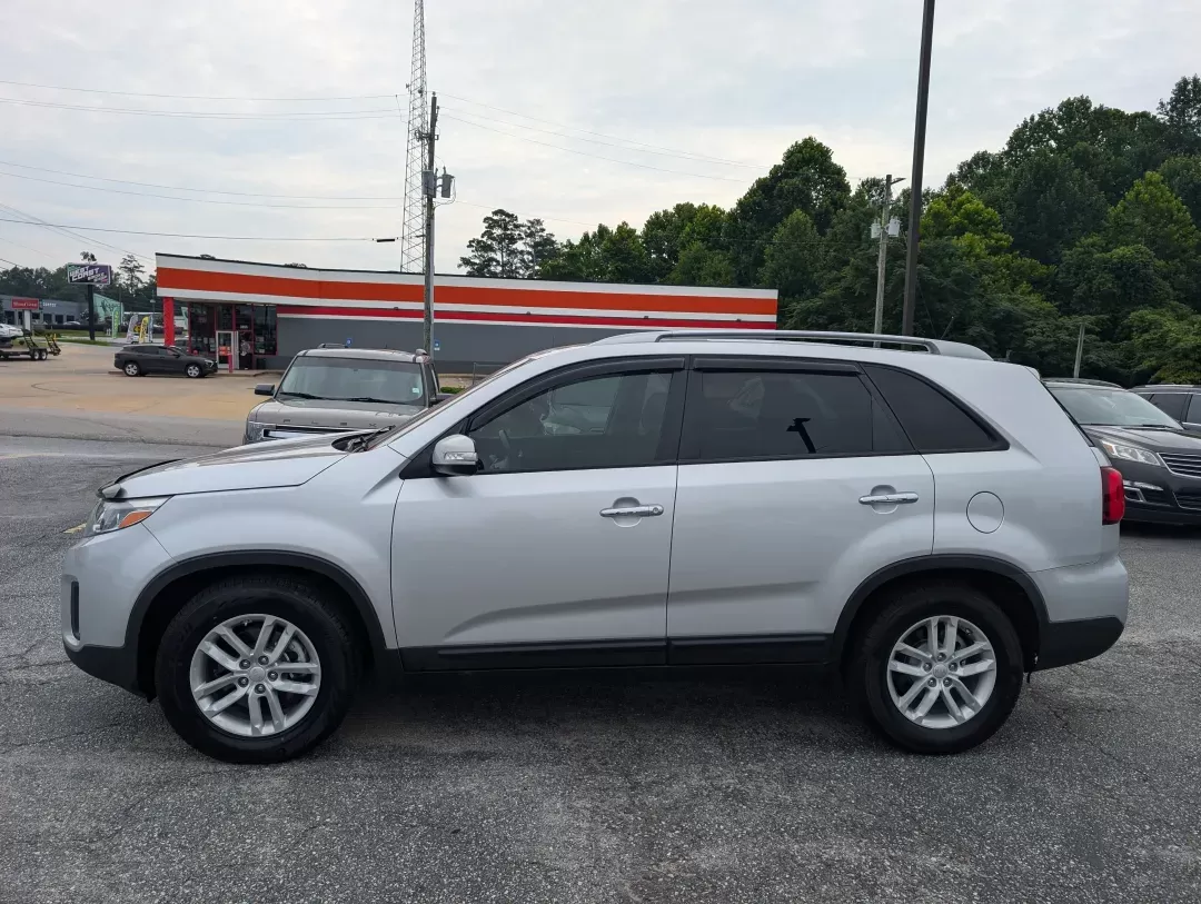 2014 /Black Kia Sorento LX (5XYKTDA6XEG) with an Other engine, located at 3959 U.S. 80 W, Phenix City, AL, 36870, (334) 297-4885, 32.469296, -85.135185 - **Embark on Your Next Adventure with the 2014 Kia Sorento LX at Gils Auto in Phenix City, AL!**<br /> <br /> Are you ready to enhance your lifestyle and explore new horizons? With the 2014 Kia Sorento LX, you'll have the perfect companion for family outings, weekend adventures, and everything in bet - Photo#7