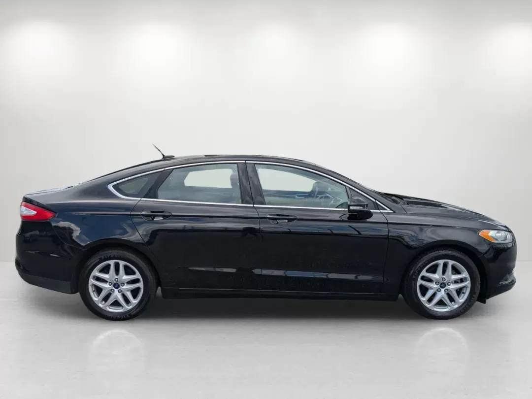 2016 Ford Fusion SE (1FA6P0HD6G5) with an Other engine, located at 804 22nd Ave, Phenix City, AL, 36870, (334) 297-1860, 32.484749, -85.024475 - **Discover Your Ideal Commuter Vehicle: 2016 Ford Fusion SE at Gils Auto - Phenix City #2!**<br /> <br /> Are you searching for a dependable sedan that seamlessly balances style, comfort, and technology? Look no further than this stunning 2016 Ford Fusion SE available at Gils Auto - Phenix City #2. - Photo#3