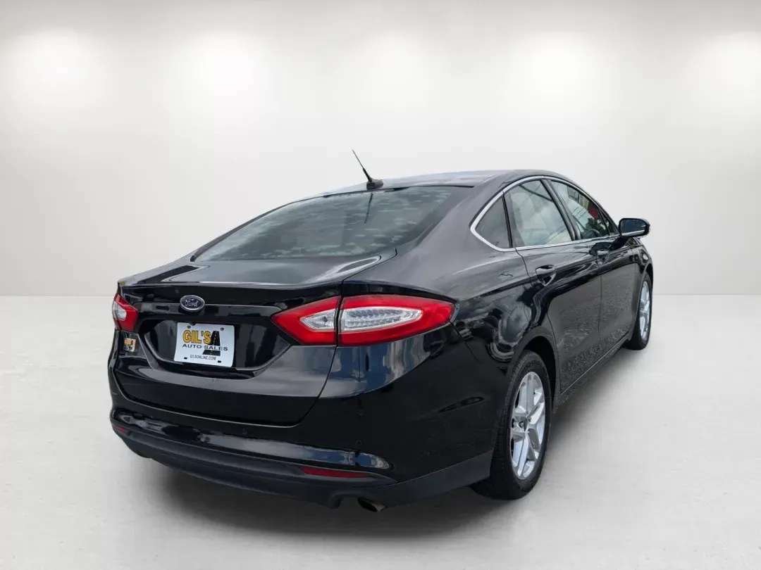 2016 Ford Fusion SE (1FA6P0HD6G5) with an Other engine, located at 804 22nd Ave, Phenix City, AL, 36870, (334) 297-1860, 32.484749, -85.024475 - **Discover Your Ideal Commuter Vehicle: 2016 Ford Fusion SE at Gils Auto - Phenix City #2!**<br /> <br /> Are you searching for a dependable sedan that seamlessly balances style, comfort, and technology? Look no further than this stunning 2016 Ford Fusion SE available at Gils Auto - Phenix City #2. - Photo#4