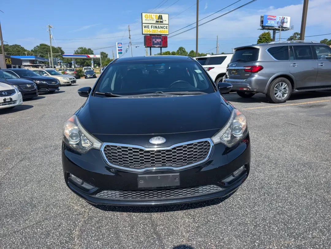 2014 /Black Kia Forte EX (KNAFX4A86E5) with an Other engine, located at 3959 U.S. 80 W, Phenix City, AL, 36870, (334) 297-4885, 32.469296, -85.135185 - **Drive Your Life Forward with the 2014 Kia Forte EX at Gils Auto!**<br /> <br /> Are you searching for a reliable sedan that seamlessly fits into your busy lifestyle? Look no further than the stunning 2014 Kia Forte EX, available now at Gils Auto, your trusted **Buy Here Pay Here** dealership in Ph - Photo#1