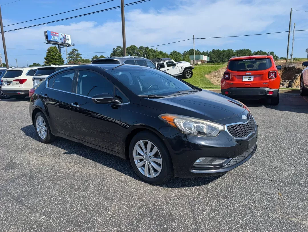 2014 /Black Kia Forte EX (KNAFX4A86E5) with an Other engine, located at 3959 U.S. 80 W, Phenix City, AL, 36870, (334) 297-4885, 32.469296, -85.135185 - **Drive Your Life Forward with the 2014 Kia Forte EX at Gils Auto!**<br /> <br /> Are you searching for a reliable sedan that seamlessly fits into your busy lifestyle? Look no further than the stunning 2014 Kia Forte EX, available now at Gils Auto, your trusted **Buy Here Pay Here** dealership in Ph - Photo#2