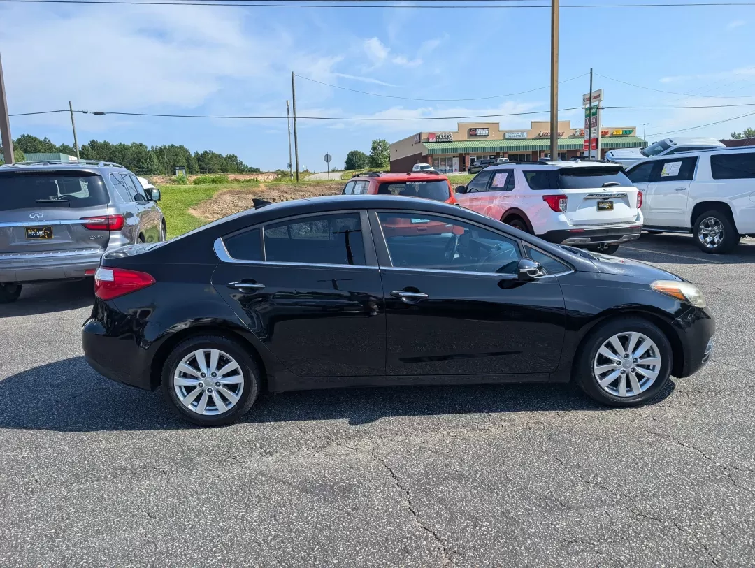 2014 /Black Kia Forte EX (KNAFX4A86E5) with an Other engine, located at 3959 U.S. 80 W, Phenix City, AL, 36870, (334) 297-4885, 32.469296, -85.135185 - **Drive Your Life Forward with the 2014 Kia Forte EX at Gils Auto!**<br /> <br /> Are you searching for a reliable sedan that seamlessly fits into your busy lifestyle? Look no further than the stunning 2014 Kia Forte EX, available now at Gils Auto, your trusted **Buy Here Pay Here** dealership in Ph - Photo#3