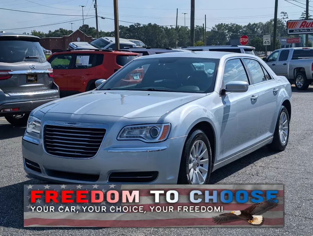 2013 /Black Chrysler 300 (2C3CCAAG2DH) with an Other engine, located at 3959 U.S. 80 W, Phenix City, AL, 36870, (334) 297-4885, 32.469296, -85.135185 - **Experience Luxury and Performance with the 2013 Chrysler 300 at Gils Auto Phenix City, AL!**<br /> <br /> Are you ready to elevate your daily commute or embark on unforgettable weekend adventures? The 2013 Chrysler 300 is not just a car; it's a statement of style and performance that enhances you - Photo#0