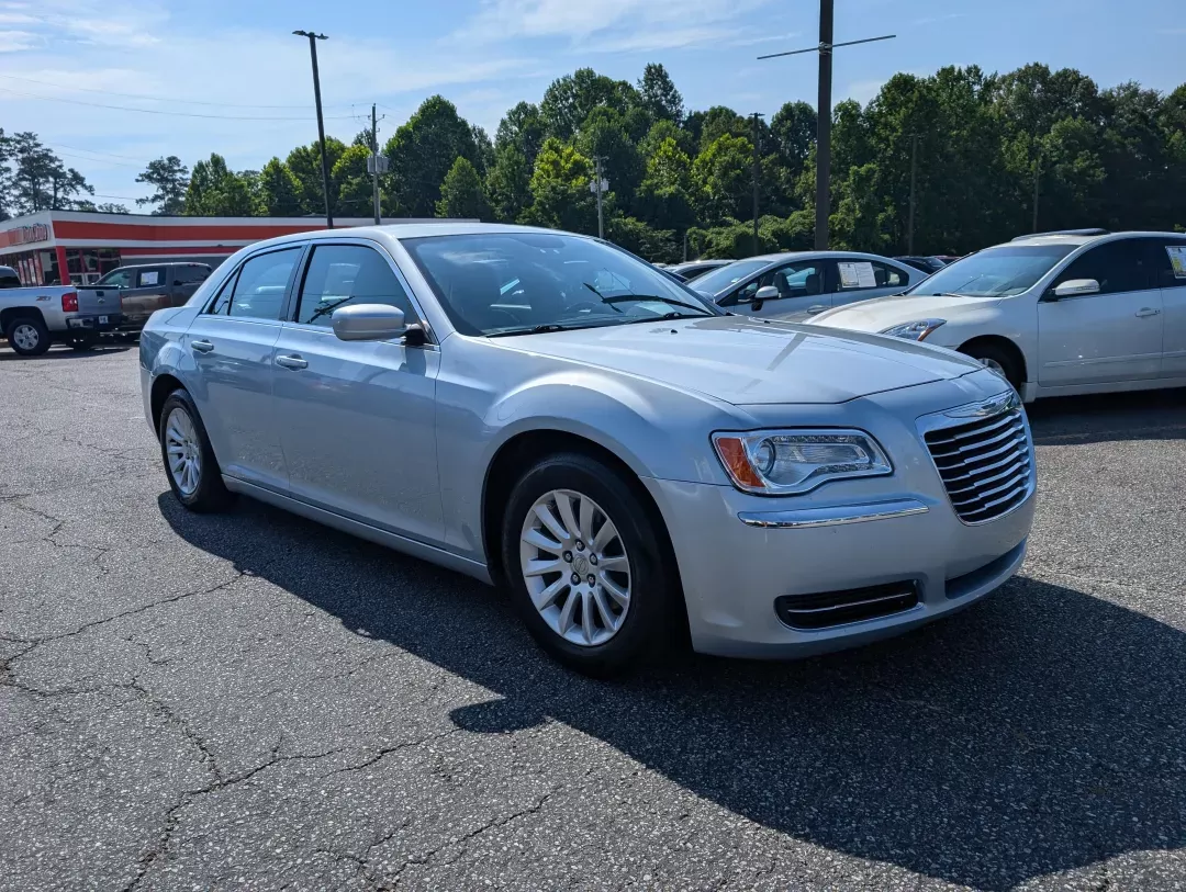 2013 /Black Chrysler 300 (2C3CCAAG2DH) with an Other engine, located at 3959 U.S. 80 W, Phenix City, AL, 36870, (334) 297-4885, 32.469296, -85.135185 - **Experience Luxury and Performance with the 2013 Chrysler 300 at Gils Auto Phenix City, AL!**<br /> <br /> Are you ready to elevate your daily commute or embark on unforgettable weekend adventures? The 2013 Chrysler 300 is not just a car; it's a statement of style and performance that enhances you - Photo#2
