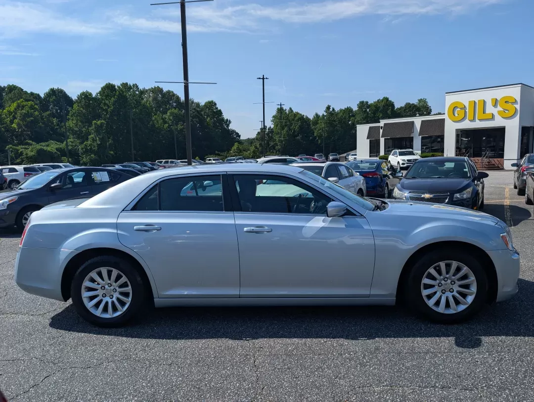 2013 /Black Chrysler 300 (2C3CCAAG2DH) with an Other engine, located at 3959 U.S. 80 W, Phenix City, AL, 36870, (334) 297-4885, 32.469296, -85.135185 - **Experience Luxury and Performance with the 2013 Chrysler 300 at Gils Auto Phenix City, AL!**<br /> <br /> Are you ready to elevate your daily commute or embark on unforgettable weekend adventures? The 2013 Chrysler 300 is not just a car; it's a statement of style and performance that enhances you - Photo#3