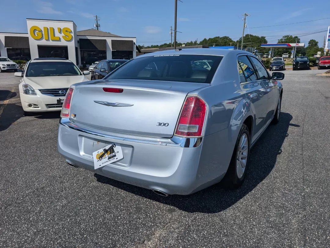 2013 /Black Chrysler 300 (2C3CCAAG2DH) with an Other engine, located at 3959 U.S. 80 W, Phenix City, AL, 36870, (334) 297-4885, 32.469296, -85.135185 - **Experience Luxury and Performance with the 2013 Chrysler 300 at Gils Auto Phenix City, AL!**<br /> <br /> Are you ready to elevate your daily commute or embark on unforgettable weekend adventures? The 2013 Chrysler 300 is not just a car; it's a statement of style and performance that enhances you - Photo#4