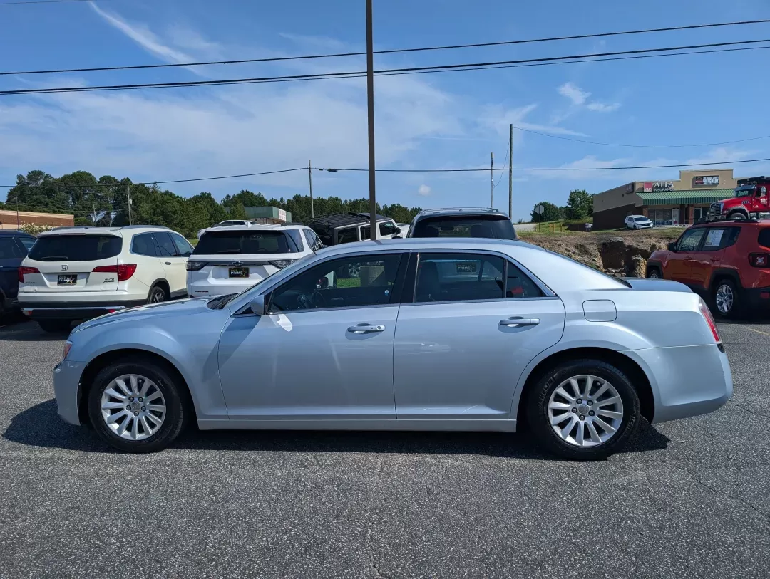 2013 /Black Chrysler 300 (2C3CCAAG2DH) with an Other engine, located at 3959 U.S. 80 W, Phenix City, AL, 36870, (334) 297-4885, 32.469296, -85.135185 - **Experience Luxury and Performance with the 2013 Chrysler 300 at Gils Auto Phenix City, AL!**<br /> <br /> Are you ready to elevate your daily commute or embark on unforgettable weekend adventures? The 2013 Chrysler 300 is not just a car; it's a statement of style and performance that enhances you - Photo#7