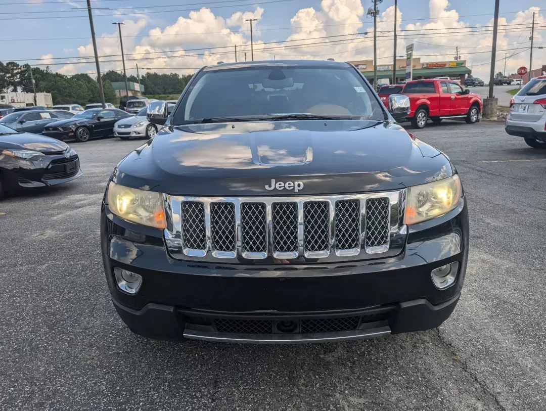 2012 /Black/New Saddle Jeep Grand Cherokee Overland Summit (1C4RJECT6CC) with an Other engine, located at 7000 Northlake Connector, Columbus, GA, 31904, (706) 987-8085, 32.524975, -84.978134 - **Conquer the Road with the 2012 Jeep Grand Cherokee Overland Summit! Ideal for Your Next Adventure!**<br /> <br /> Are you ready to elevate your driving experience? The 2012 Jeep Grand Cherokee Overland Summit is the perfect companion for those who crave adventure without sacrificing comfort. Wheth - Photo#1