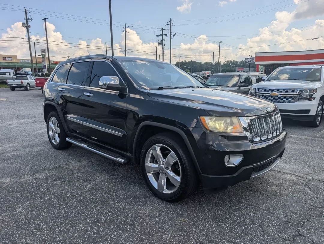 2012 /Black/New Saddle Jeep Grand Cherokee Overland Summit (1C4RJECT6CC) with an Other engine, located at 7000 Northlake Connector, Columbus, GA, 31904, (706) 987-8085, 32.524975, -84.978134 - **Conquer the Road with the 2012 Jeep Grand Cherokee Overland Summit! Ideal for Your Next Adventure!**<br /> <br /> Are you ready to elevate your driving experience? The 2012 Jeep Grand Cherokee Overland Summit is the perfect companion for those who crave adventure without sacrificing comfort. Wheth - Photo#2
